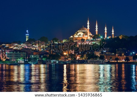 Beautiful picture of night Istanbul with view on Golden Horn bay, Suleymaniye Mosque, Beyazıt Tower and many restaurants. HDR image