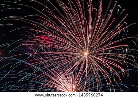 Spectacular fireworks exploding in the night sky