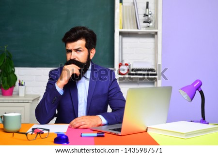 Preparing for exam in college. Portrait of male university student indoors. Knowledge day. Student and tutoring education concept. Teacher preparing for university exams. Teachers day. Young teacher.