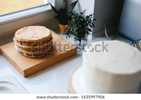 Girl baker prepares a delicious berries cheesecake