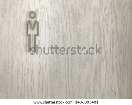 Bathroom sign on wooden floor, Toilet