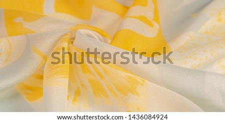 Texture, background, pattern, silk fabric, yellow flowers on a gray background. Your projectors will be pacified, this delicate fabric in pastel colors will cause decks and fantasies
