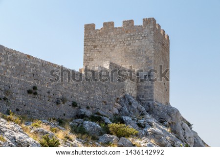Medieval Starigrad Fortress standing above Omis town in Dalmatia, Croatia