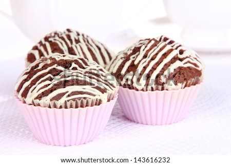 Sweet chocolate cupcakes close up