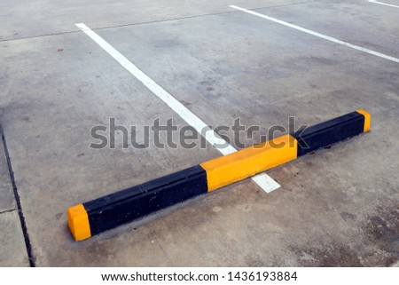 Barrier in the parking lot for determining where the car came in