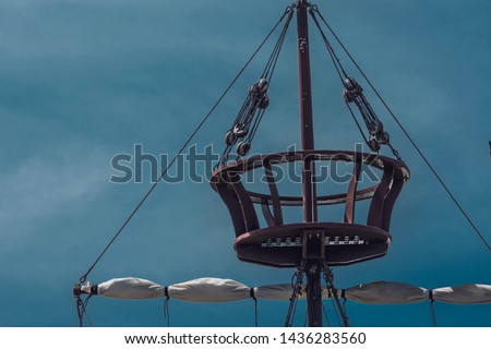 Close up on crow’s nest on an historical themed pirate ship Royalty-Free Stock Photo #1436283560