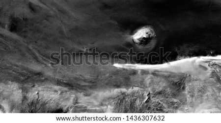 Io from Jupiter, allegory, abstract naturalism, Black and white photo, abstract photography of landscapes of the deserts of Africa from the air, aerial view, contemporary photographic art, 