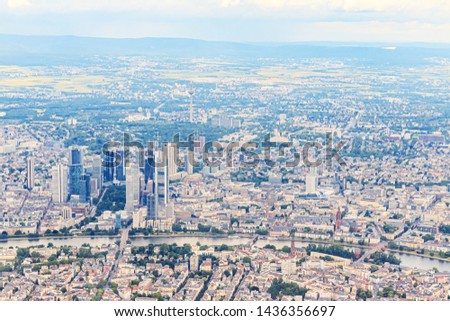 Blurred landscape from the plane window. View from airplane. Aerial view of Germany from plane. Frankfurt am Main Cityscape View from Airplane Window
