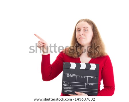 Woman with clapperboard pointing at something