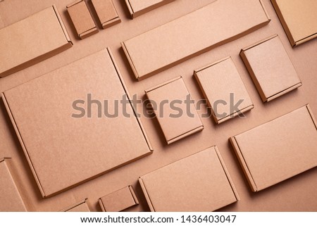 Set of Brown craft cardboard boxes, background Royalty-Free Stock Photo #1436403047