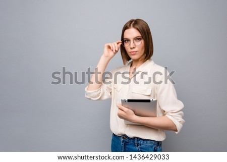 Close up side profile photo beautiful she her business lady chief e-reader hands arms reader classroom lesson lecture online webinar learn wear specs casual white shirt isolated grey background