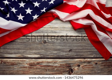 American flag on old rustic wooden board. Concept Important Day American Empty space for design