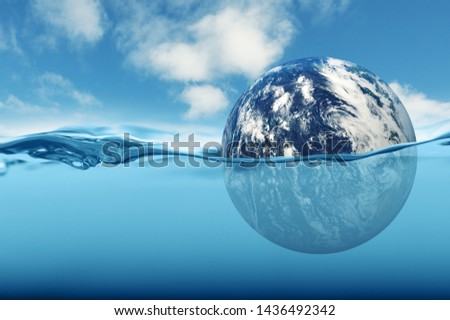 Earth rising sea level concept Royalty-Free Stock Photo #1436492342