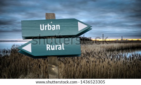 Street Sign the Direction Way to Urban versus Rural