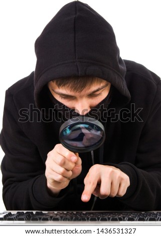Hacker with a Computer Keyboard and Magnifying Glass Isolated on the White Background