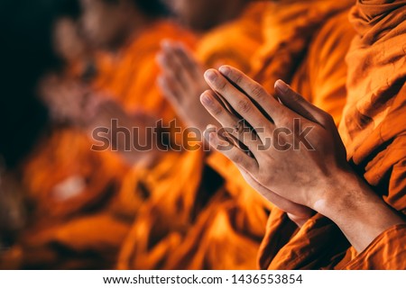The monks are chanting a Buddhist ritual in it. Royalty-Free Stock Photo #1436553854