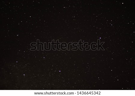 Stars in the night sky background texture milky way glow of stars.
Dark interstellar space.Stars in a deep space.Dark night sky.Flying dust particles on a black background.Starfield. Starry Night Sky.