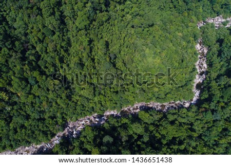 Aerial view waterfall in tropical rainforest deep mountain nature landscape