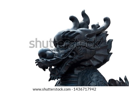 Close up of vintage retro traditional Black Chinese Lion head statue crop that related to Buddhism Chinese religion isolated on a white background 