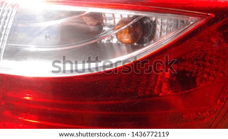 rear light of a modern car in the daytime
