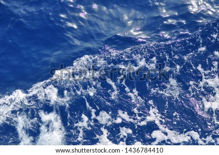 Beautiful Deep Blue Mediterranean Sea Water. Ocean Waves. Cruise Ship Vacation in Europe