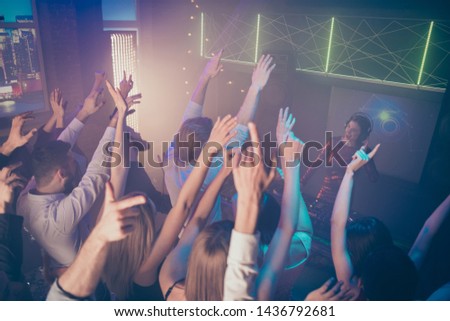 Above high angle view of nice attractive smart glamorous stylish positive carefree cheerful cheery guys having fun hanging out rising hands up in new cool modern place indoors