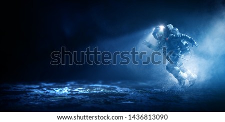 Astronaut in space costume in outer space. Spacewalk Royalty-Free Stock Photo #1436813090