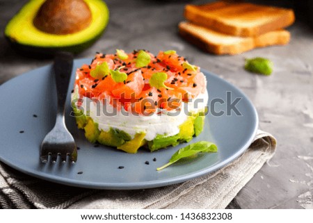Tartar with salmon, avocado, cream cheese and toast