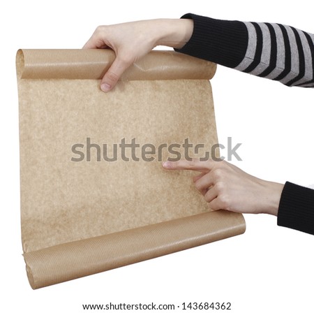 Human hand holding a piece of paper.