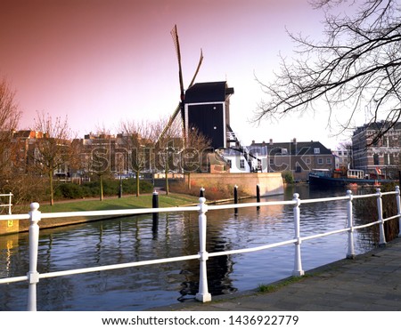 Windmills and river landscaping in a Dutch city park