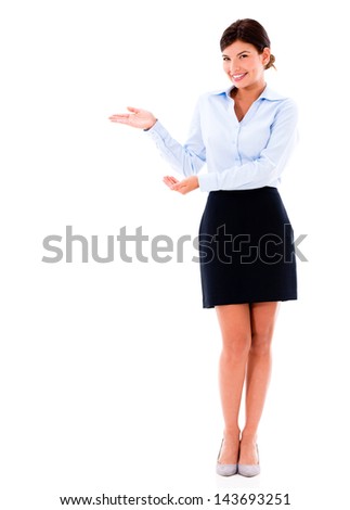 Welcoming business woman presenting something - isolated over white