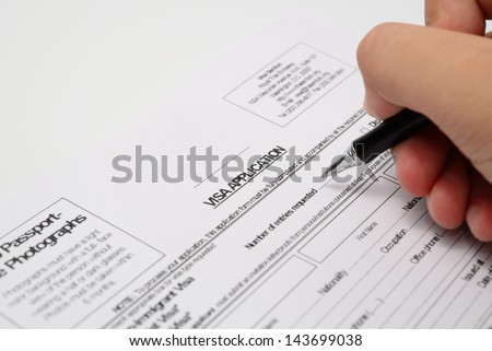 Filling in an application form for visa entry