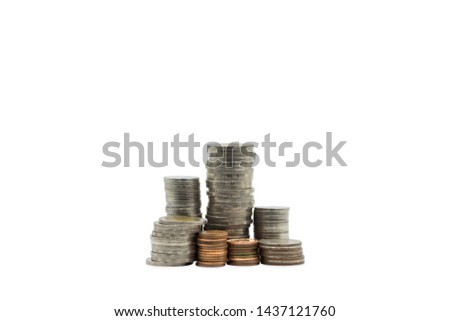 Stacks of coin isolated on white background.