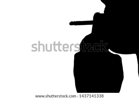 silhouette of close up young man smoking cigarette with isolated white background