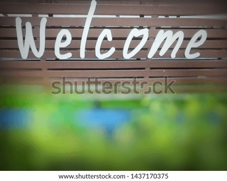 welcome made from sign wood background
