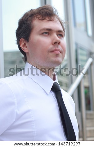 Young businessman looking forward