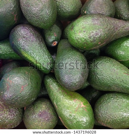 Macro Photo food fruit avocado. Texture of juicy green tropical vegetables avocado.