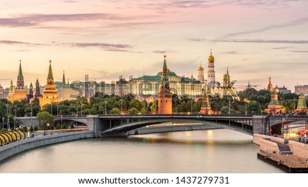 Moscow at sunset, Russia. Warm view of Moscow Kremlin, famous landmark of Russia and World. Scenery of Russian capital, nice urban landscape. Panorama of old city at Moskva River. Russia concept. Royalty-Free Stock Photo #1437279731