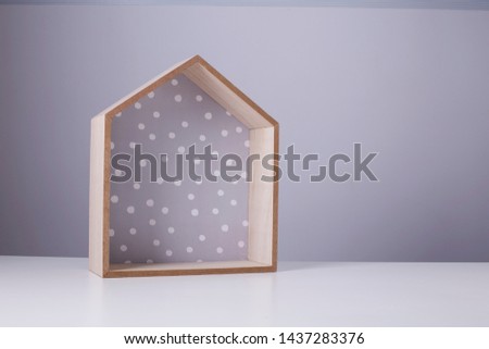 Decorative house shaped wood box, wooden case for storage and home decor, minimalist arrangement