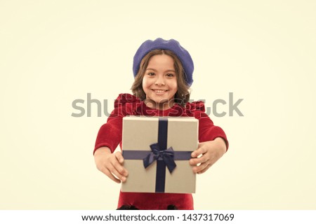 Best birthday and christmas gifts. Kid little girl in elegant dress curly hairstyle hold gift box. Child excited about unpacking her gift. Small cute girl received holiday gift. Dreams come true.