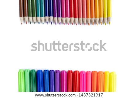 Closeup images of many color pencils isolated on white background. Flat lay, top view, school concept
