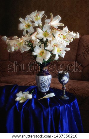 Still life with bouquet of lily flowers in interior