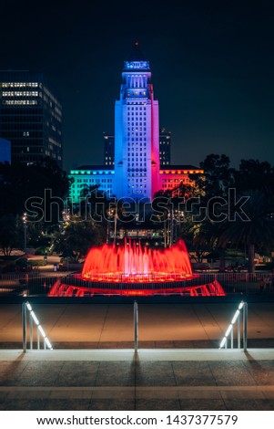 Fountains at Grand Park, and City Hall at night, in downtown Los Angeles, California