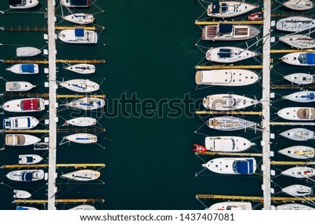 This is a one of a kind birds eye view or patterned boats docked at a marina!