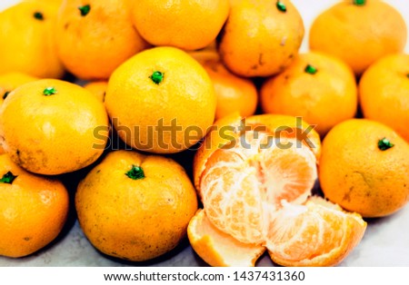 Fresh mandarin oranges background, clean tangerine close up