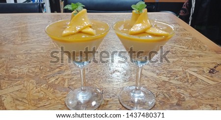 Mango cheesecake in shot glass