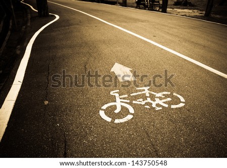 Sepia bicycle road sign