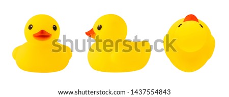 Set of front, side and top views of yellow rubber duck isolated on white background