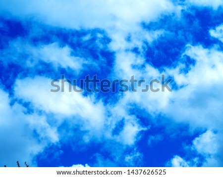 bright colors, partial clouds. Clearing day, Good weather in the morning. Blue sky background with Air clouds. sky panorama, scattered cumulus dark clouds for background backdrop wallpaper, desktop