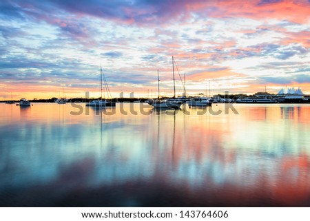 Reflections in The Broadwater at sunrise. Gold Coast, Australia Royalty-Free Stock Photo #143764606